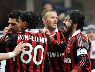 Marco Borriello and Ronaldinho and David Beckham and Gennaro Gattuso of Milan celebrate the goal during the Serie A match between Milan and Siena at Stadio Giuseppe Meazza on January 17, 2010 in Milan, Italy.