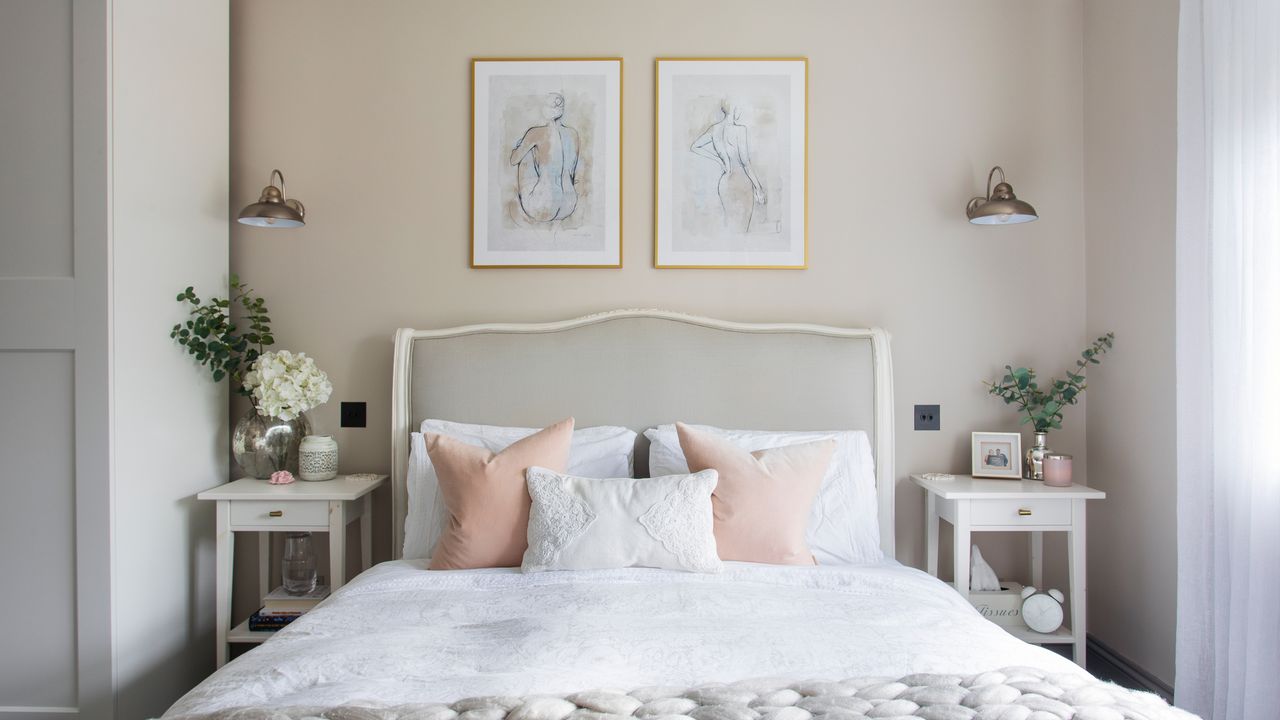 White bedroom with pictures