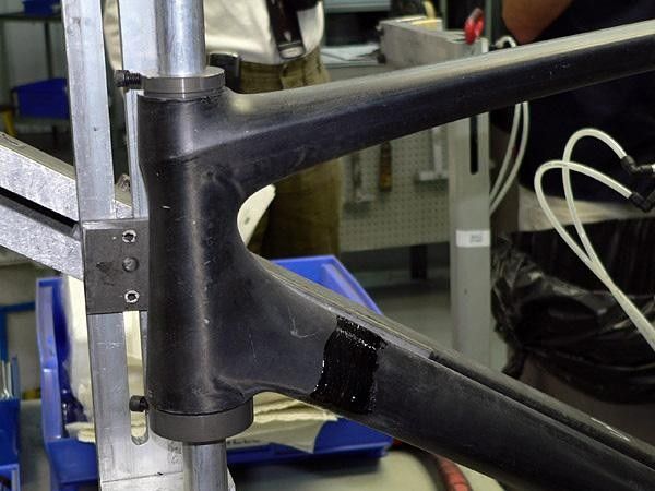 Excess glue will be wiped away prior to the curing stage.