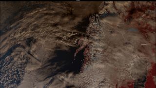 Norway shaded by the moon during the solar eclipse on Oct. 25 as seen by the European Earth-observing satellite Sentinel-3.