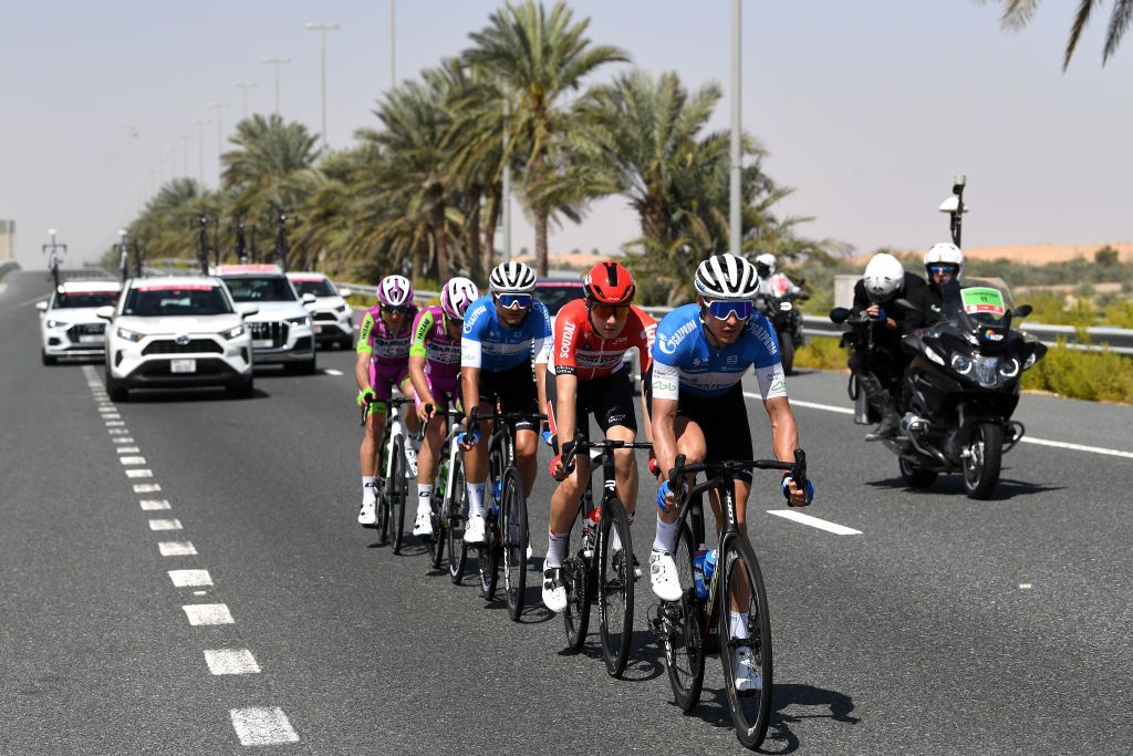 MADINAT ZAYED UNITED ARAB EMIRATES FEBRUARY 20 Pavel Kochetkov of Russia and Team Gazprom Rusvelo Xandres Vervloesem of Belgium and Team Lotto Soudal Dmitrii Strakhov of Russia and Team Gazprom Rusvelo Luca Rastelli of Italy and Team Bardiani Csf Faizane Alessandro Tonelli of Italy and Team Bardiani Csf Faizane compete in the breakaway during the 4th UAE Tour 2022 Stage 1 a 184km stage from Madinat Zayed to Madinat Zayed UAETour WorldTour on February 20 2022 in Madinat Zayed United Arab Emirates Photo by Tim de WaeleGetty Images