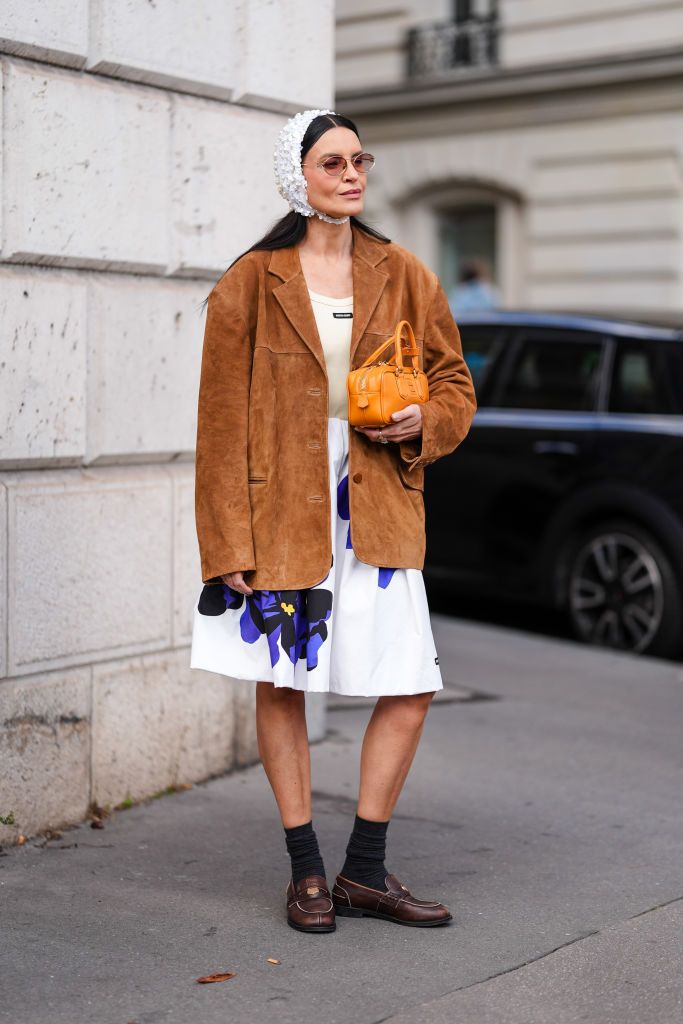 influencer at fashion week wearing miu miu loafers