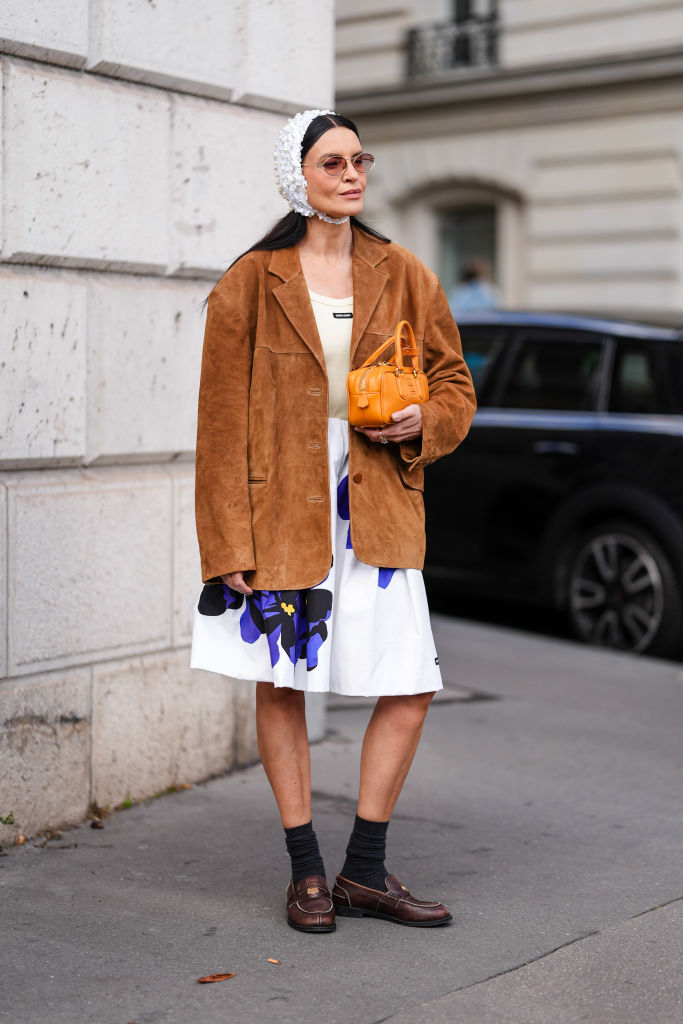 influencer at fashion week wearing miu miu loafers