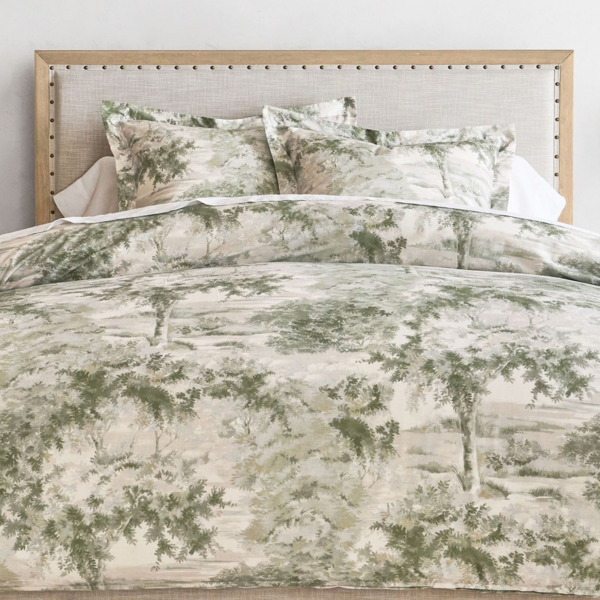Green and white Pottery Barn toile bedding