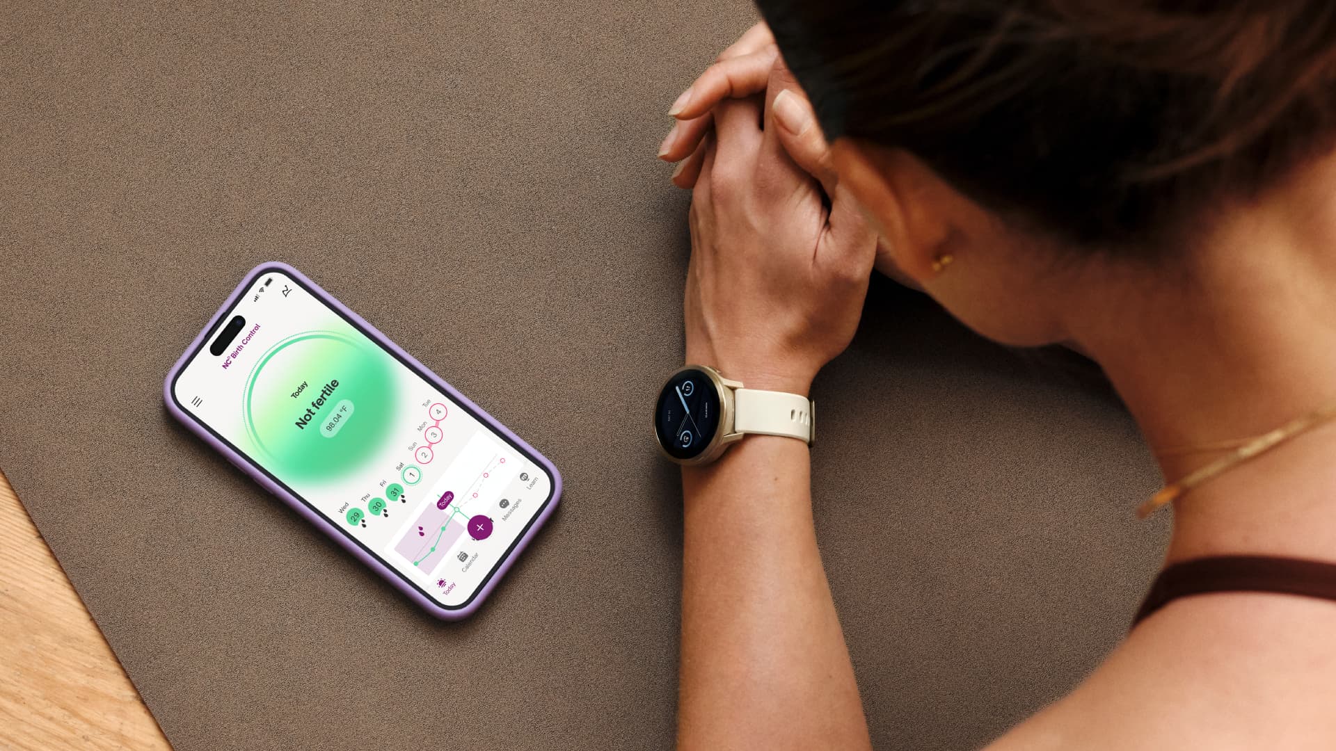 An iPhone and Garmin smartwatch showing a person's cycle tracking information.