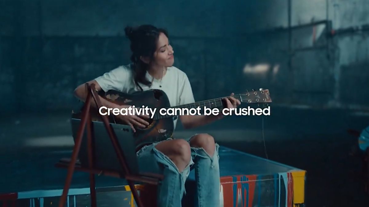 Samsung &quot;UnCrush&quot; advert reply to Apple&#039;s &quot;Crush!&quot; advert, woman playing guitar.