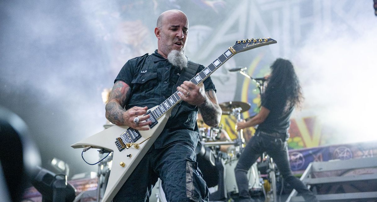 Scott Ian of Anthrax riffs on his custom Floyd-equipped Jackson King V while frontman Joey Belladonna sings in the background