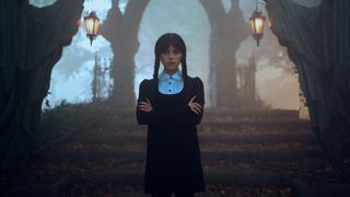 Wednesday crosses her arms in Wednesday season 2