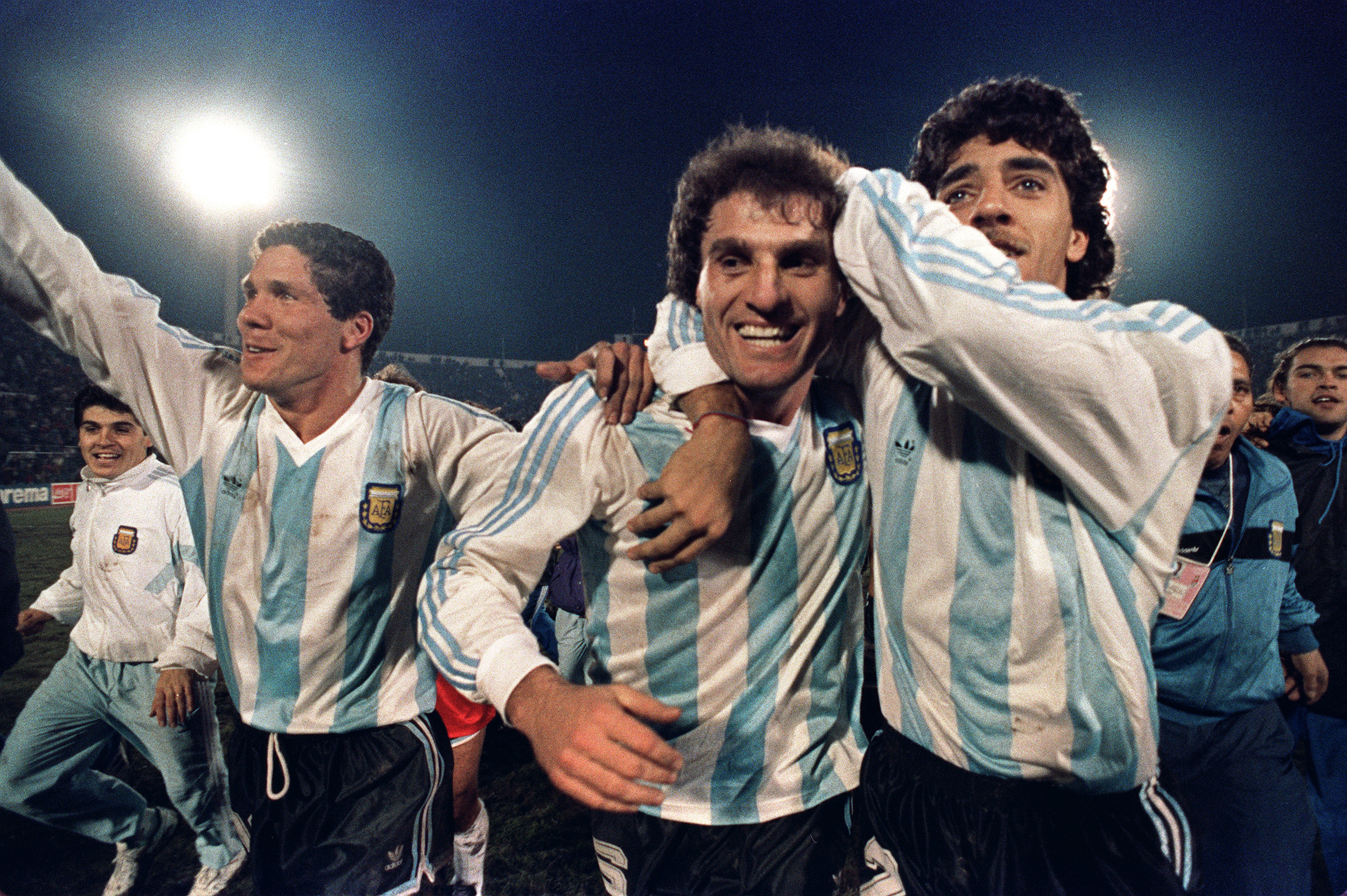 Oscar Ruggeri (centre) celebrates with Diego Simeone (left) and Sergi Vasquez after winning the Copa America in 1991.