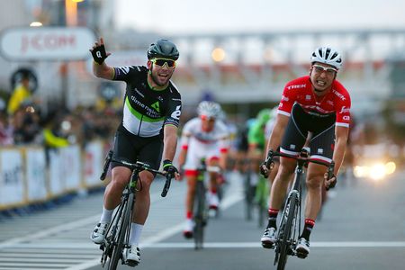 Mark Cavendish celebrates victory ahead of Fumiyuku Beppu in the Saitama Criterium.