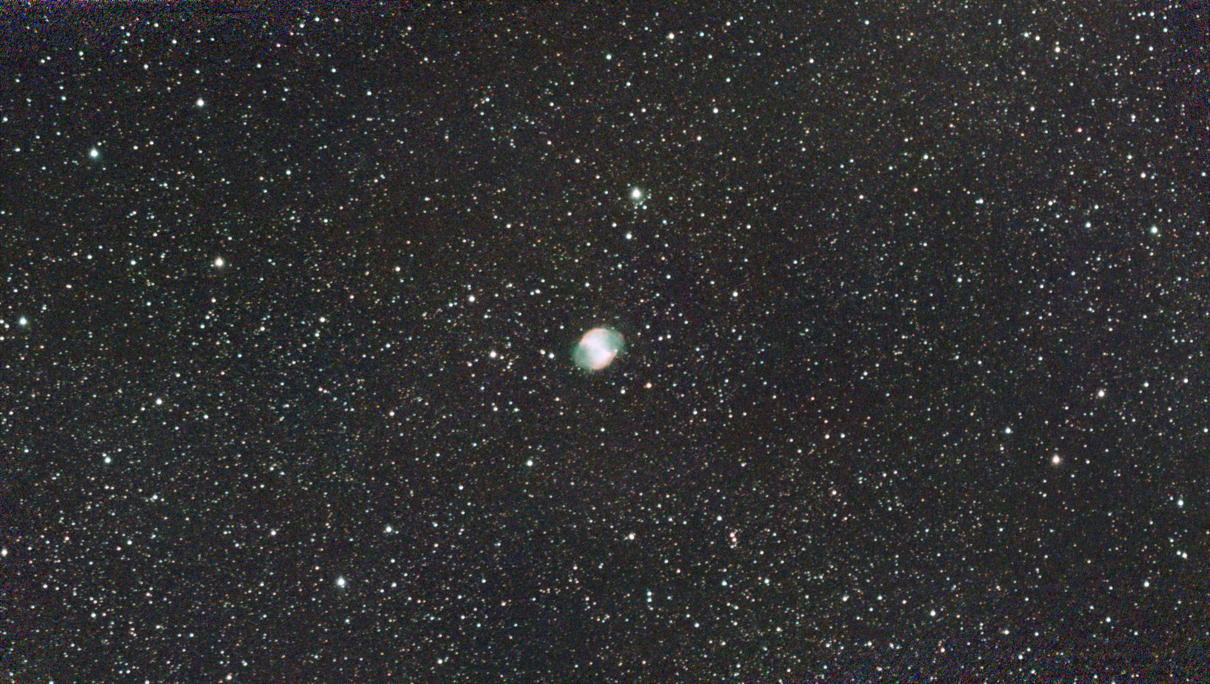 A photograph of the Dumbbell Nebula taken with the Dwarf III smart telescope, unprocessed
