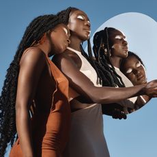 Models holding a mirror