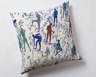 Human figures and plants on cushion cover