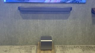 Samsung HW-Q990F soundbar and subwoofer in a grey room