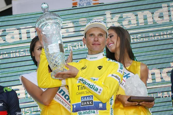 Rafal Majka (Tinkoff - Saxo) shows off his victory trophy on the final podium