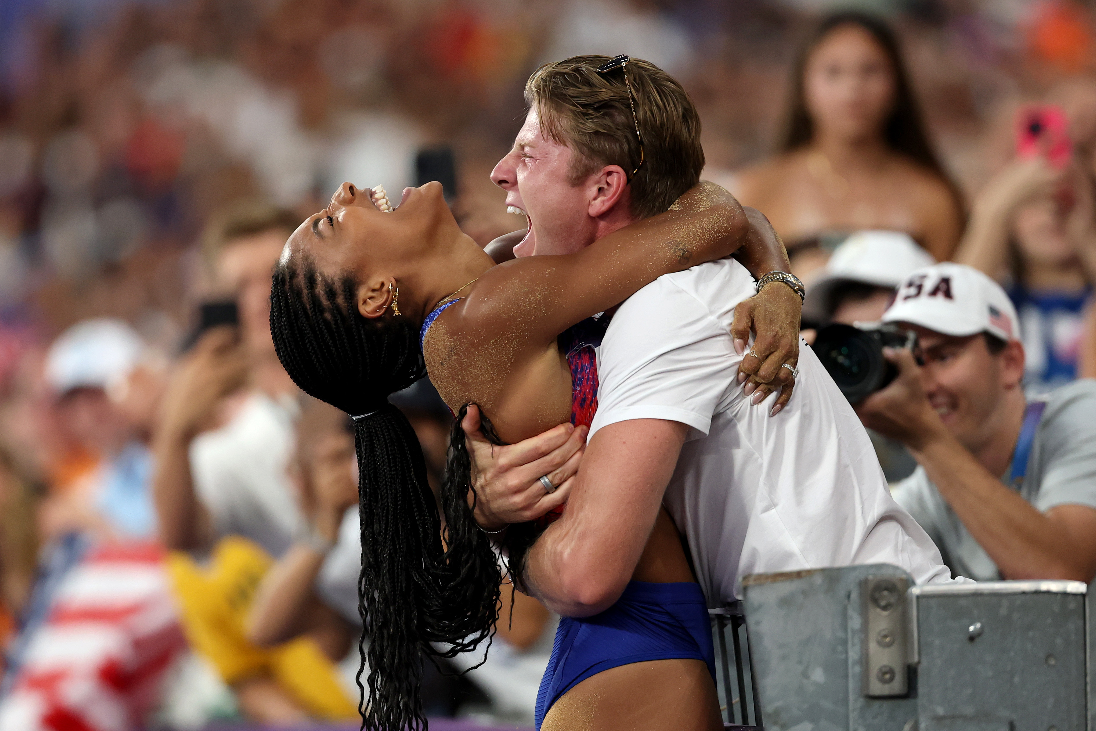 Tara Davis-Woodhall of Team United States celebrates winning the gold medal after competing in the Women's Long Jump Final on day thirteen of the Olympic Games Paris 2024 at Stade de France on August 08, 2024 in Paris, France.