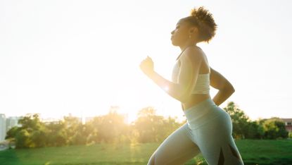 Woman running a 5K outdoors