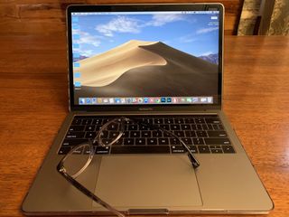 MacBook Pro with computer glasses