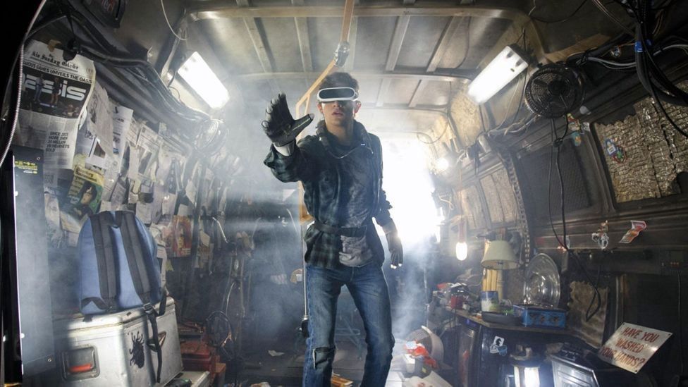 Boy playing game through virtual headset