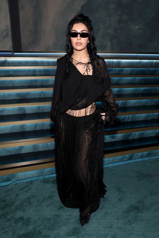 Charli XCX at the 2025 grammy awards wearing her second outfit of the night