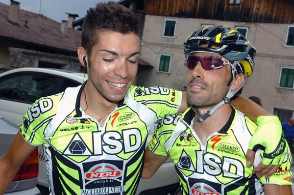 Giovanni Visconti and ISD teammate Santo Anza celebrate after the finish.