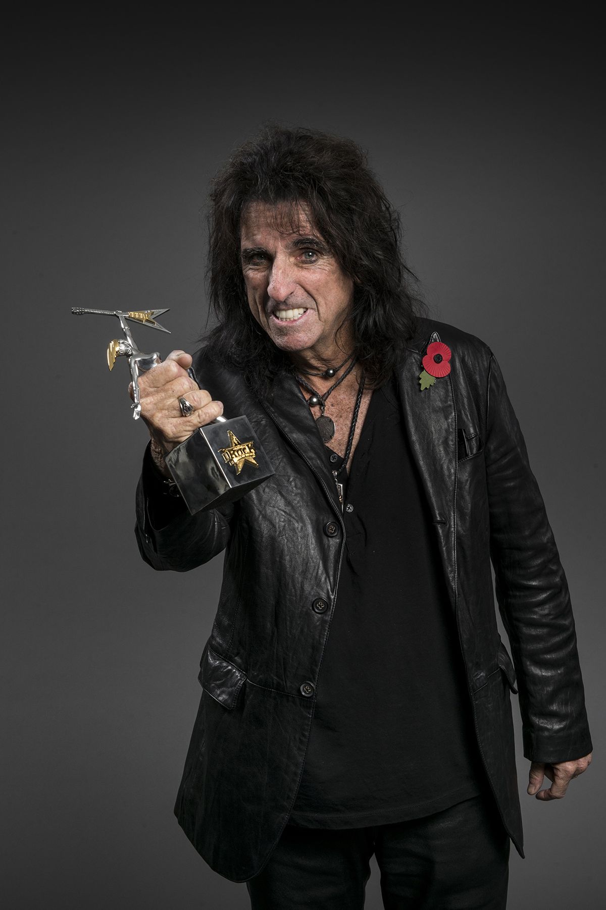 Alice Cooper with his Classic Album award (for Welcome To My Nightmare)