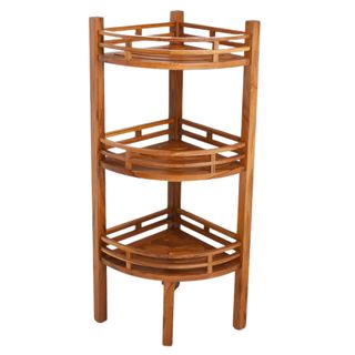 A brown wooden free standing corner shelving unit