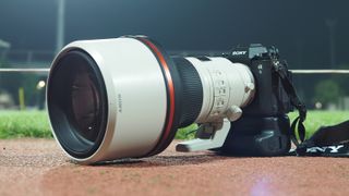 Sony FE 300mm f/2.8 GM OSS lens, mounted to a Sony A9 III, at a sports track