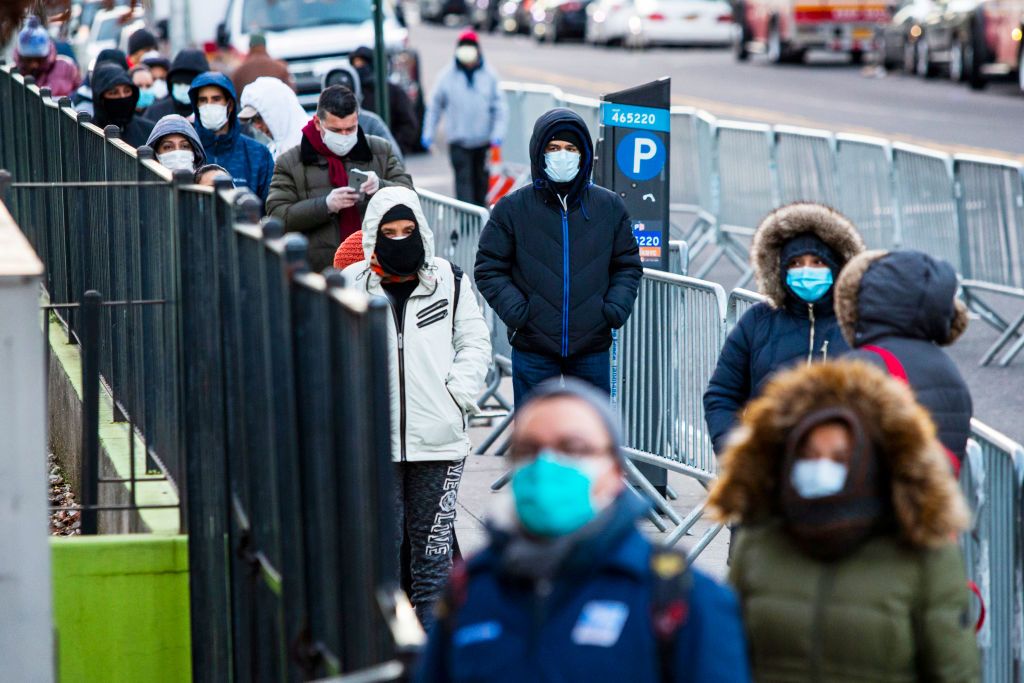 People wait for coronavirus tests at Elmhurst Hospital.