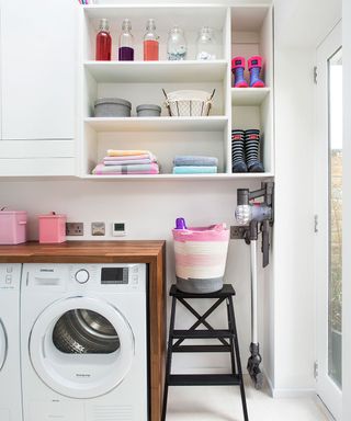 Organised utility room with open cupboards
