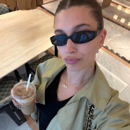 Hailey Bieber's Seoul Style Includes Two Chanel Bags, a Sheer Crochet Top, and Her Favorite Heeled Flip-Flops