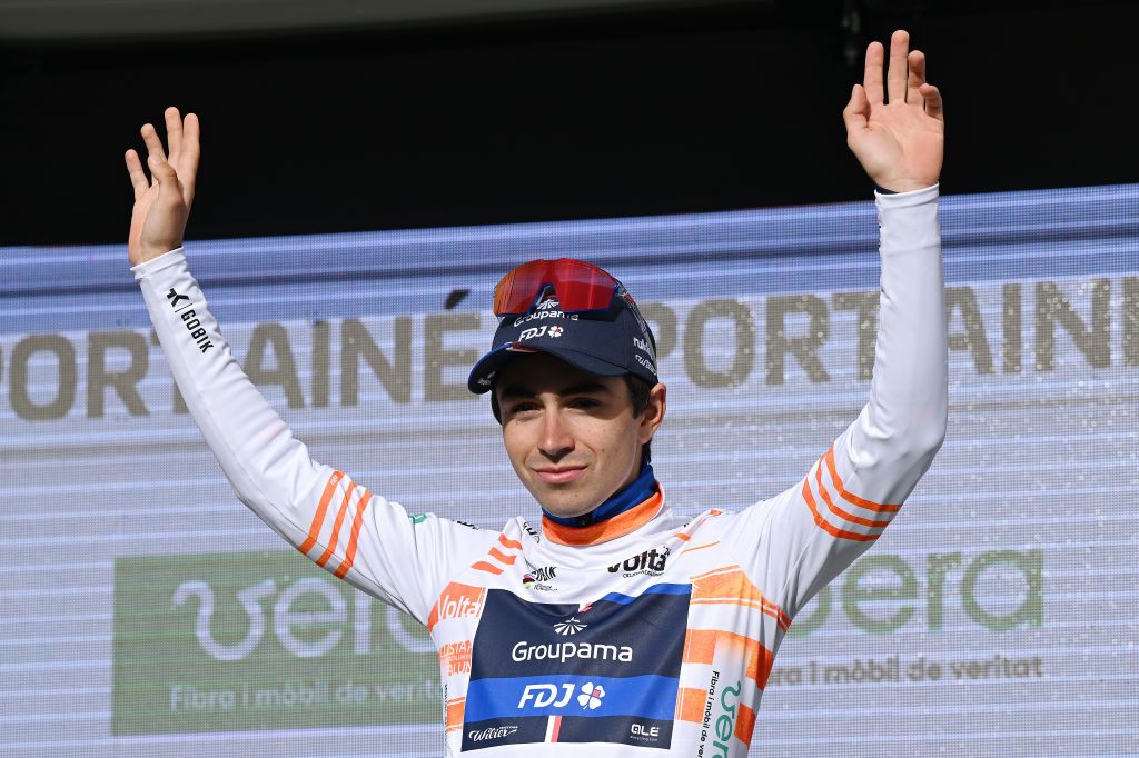 PORT AINE SPAIN MARCH 20 Lenny Martinez of France and Team GroupamaFDJ celebrates at podium as Orange Young Jersey winner during the 103rd Volta Ciclista a Catalunya 2024 Stage 3 a 1767km stage from Sant Joan de les Abadesses to Port Aine 1967m UCIWT on March 20 2024 in Port Aine Spain Photo by David RamosGetty Images
