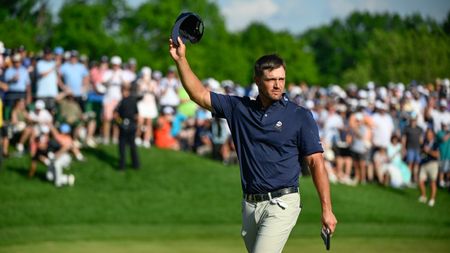 Bryson DeChambeau celebrates after finishing the 2024 PGA Championship