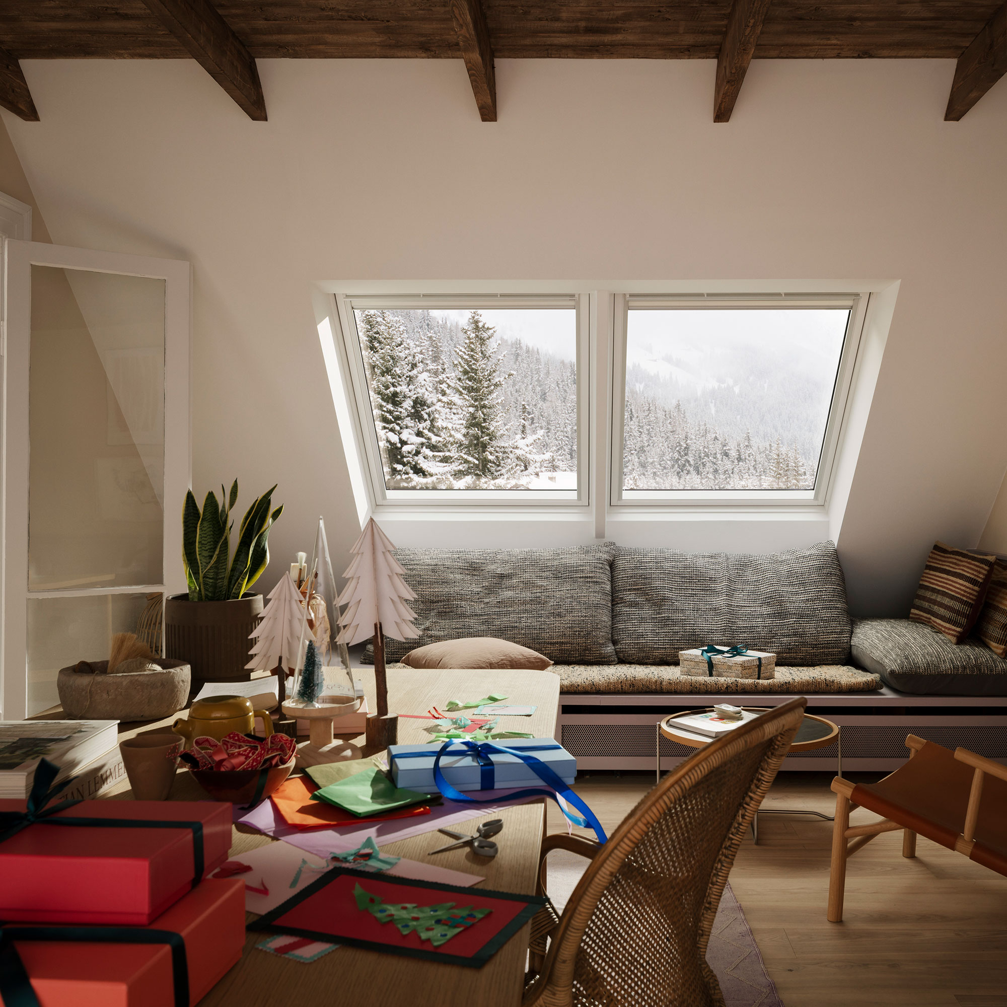 Eaves room in house with two roof windows