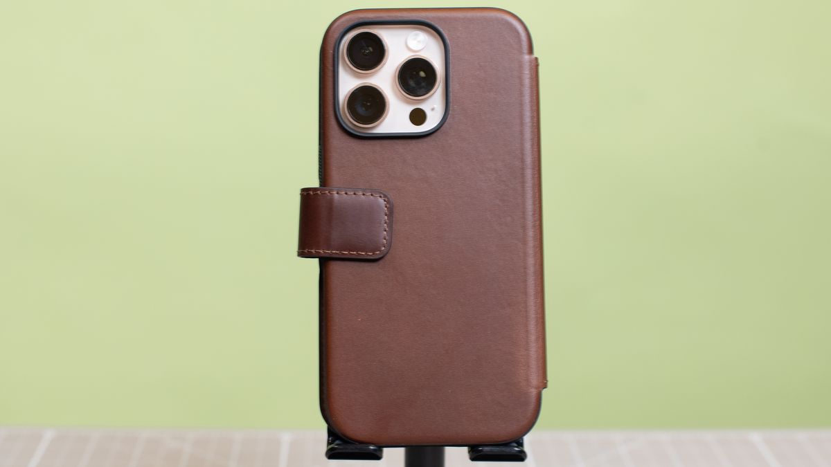 Nomad modern leather folio with iPhone 16 Pro in desert titanium inside showing multiple angles and buttons and camera cutout hole