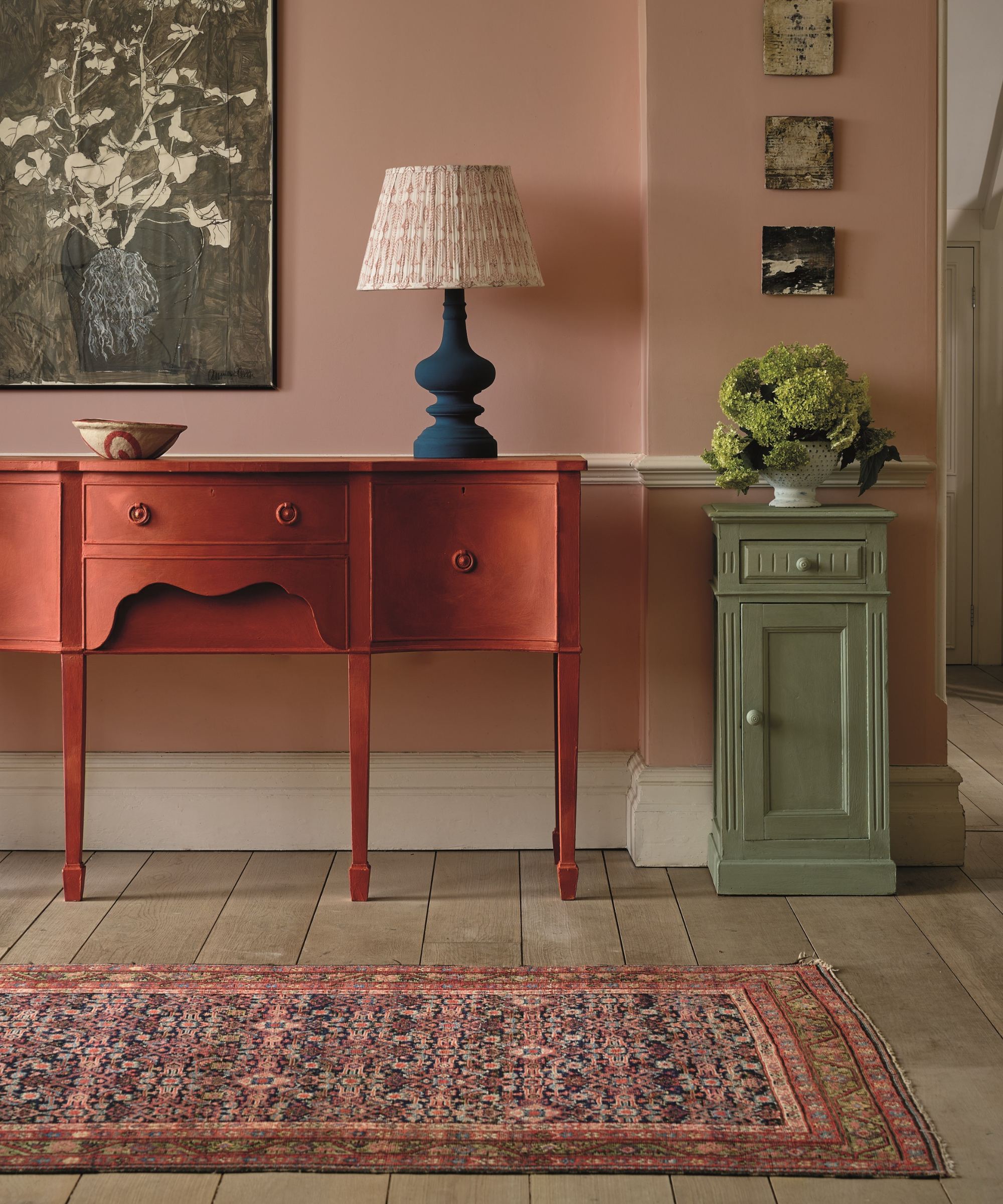 Hallway with colourful runner and furniture