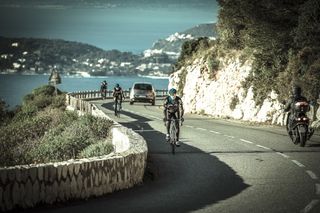 The riders climb above Cap Ferrat