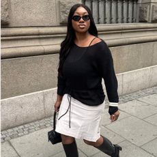 An image of @nnennaechem wearing one of the biggest spring boot trends of 2026. 