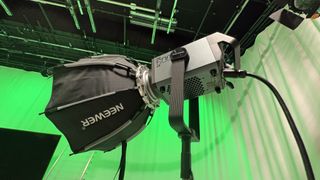 Neewer AS600B video light in a studio