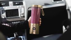 Best portable blender for protein shakes - the Blendjet 2 berry smoothie in gold blender in car