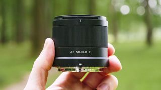 Viltrox AF 50mm F2 Air lens in the hand