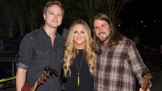 (L-R) Ethan Ballinger, Lee Ann Womack and Lukas Nelson gather for a photo at Maui Arts & Cultural Center during the BMI Maui Songwriters Festival on December 2, 2016 in Kahului, Hawaii.