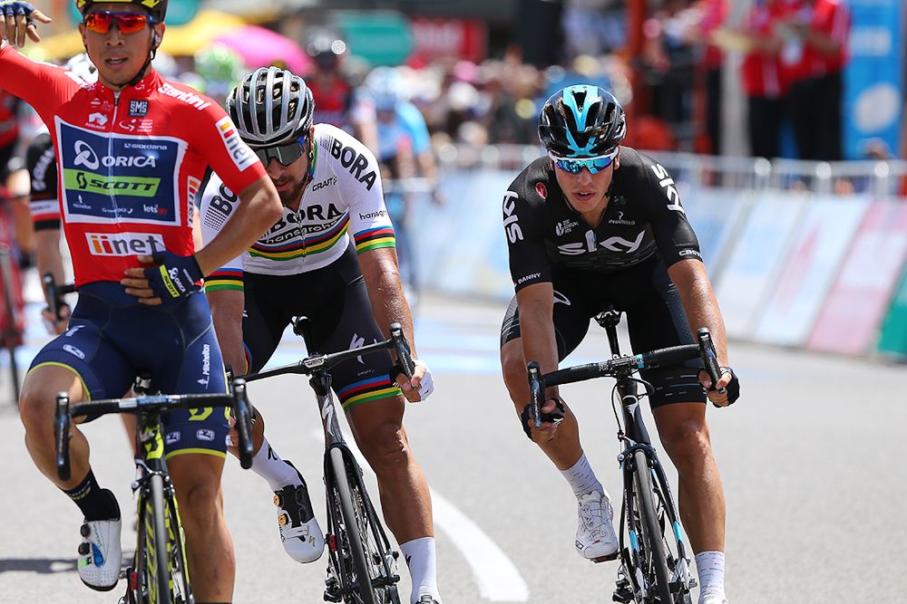 Peter Sagan and Danny Van Poppel cross the line behind Caleb Ewan