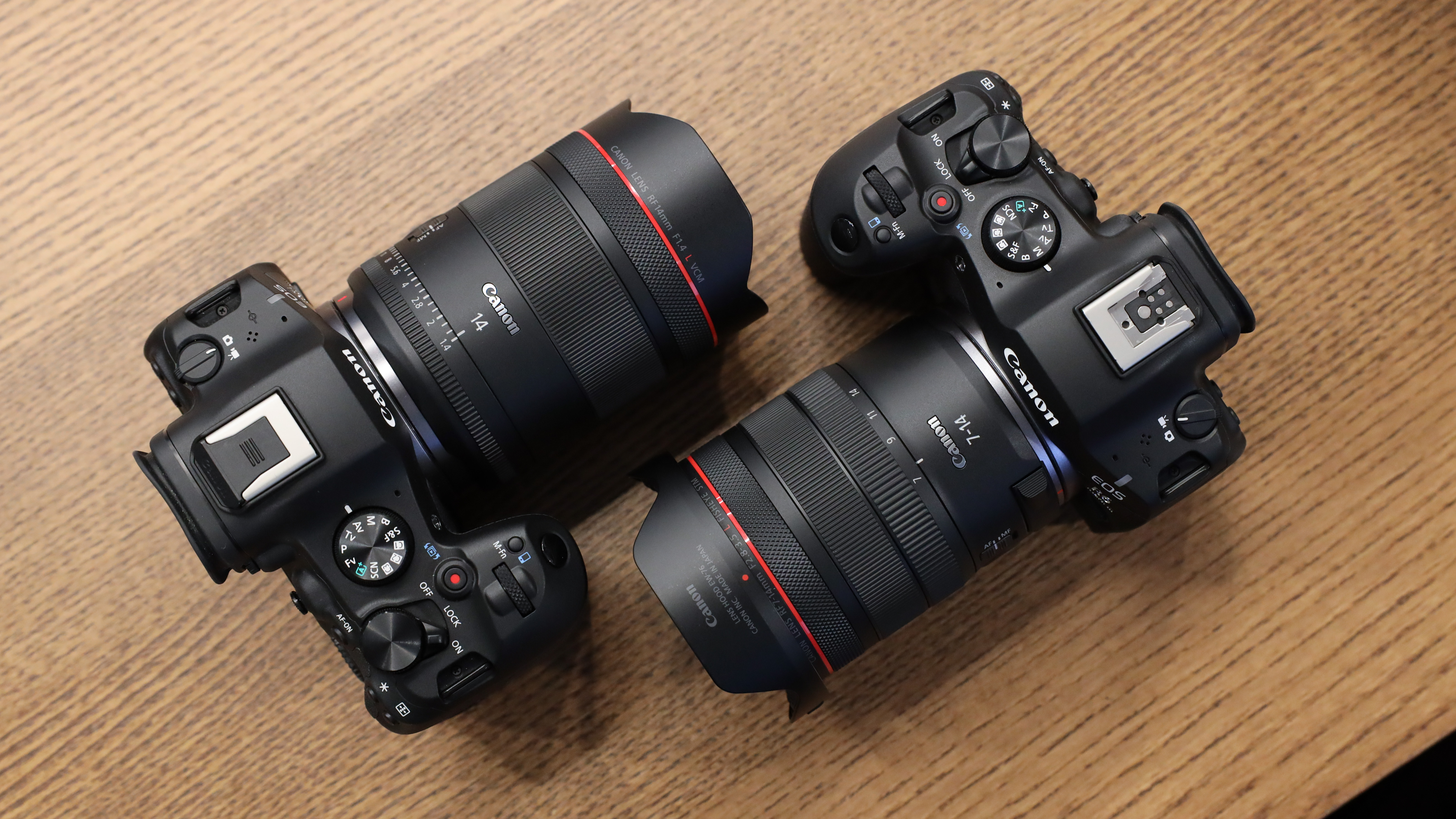 Canon EOS R6 Mark III camera with Canon RF 14mm f/1.4L VCM lens attached, next to a Canon EOS R6 Mark III camera with Canon RF 7-14mm f/2.8-3.5L Fisheye STM lens attached