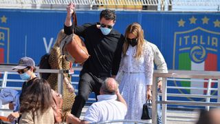 Ben Affleck and Jennifer Lopez board a water tax in Venice