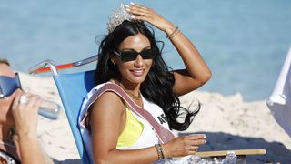 Monica Garcia wearing a crown on the beach in The Real Housewives of Salt Lake City season 4