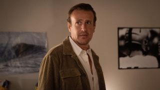 Jason Segel looking to the side in Shrinking