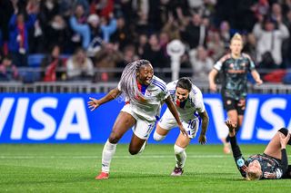 Kadidiatou Diani of Lyon celebrates her goal during the UEFA Women's Champions League Quarter Finals Second Leg match between Olympique Lyonnais and FC Bayern Munchen at OL Stadium on March 26, 2025 in Lyon, France.