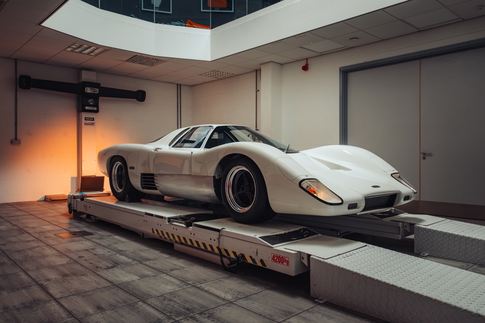 The rebuilt McLaren M6GT, in white,