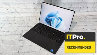 A photograph of the Dell XPS 15 overlaid with the IT Pro recommended award